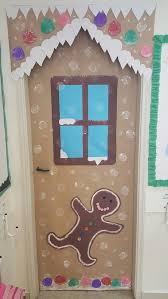 For those who want to decorate their homes in holiday spirit on a dime, this is the project for you. Gingerbread House Door Decoration For School Christmas Door Decorating Contest Classroom Christmas Decorations School Door Decorations