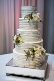 Get directions to desired branch. Tiered White Wedding Cake With White Flowers Chicago Style Weddings