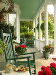 12 Ideas For Adding Curb Appeal Front Porch Decorating Country Porch Porch Decorating