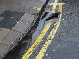 Image result for gutters curb in rain
