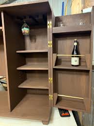 The best mini fridges for dorms or homes to keep beverages, snacks, and leftovers chilled. Liquor Cabinet I M Working On Is Almost Done Mini Fridge Goes On The Left That S A 500 Ml Bottle Woodworking