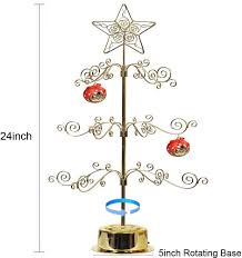 The best way to display your most treasured ornaments, and those too small or delicate to risk on a regular tree. Amazon Com Hohiya Ornament Display Tree Stand Metal Christmas Rotating Tabletop Easter Egg Trees 24inch Gold Kitchen Dining