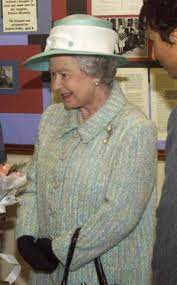 Britain S Queen Elizabeth Ii Meets A Pupil During A Visit To The St Martin In The Fields High School For Girls Her Majesty The Queen Queen Elizabeth Queen Hat
