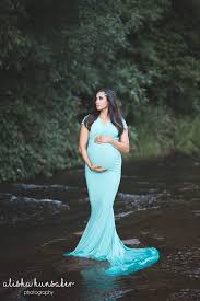 Look for maternity photoshoot dresses in the collection of our best maternity photoshoot gowns. Buy Gold Maternity Photoshoot Dress Cheap Online