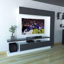 The crisp white molding isn't exclusive to the wall unit; Top 50 Modern Tv Stand Design Ideas For 2020 Engineering Discoveries Tv Stand Modern Design Modern Tv Wall Units Modern Tv Unit Designs