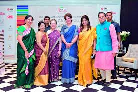 She accessorized her look with a diamond emerald necklace set and gold clutch! A Rendezvous With The Gandhi Ladies