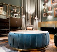A woven basket and rug of natural textures complete the look that is a throwback to a time of washboards, washtubs and lye soap. Luxury Center Tables 25 Unique Designs For Bold Living Rooms In 2021