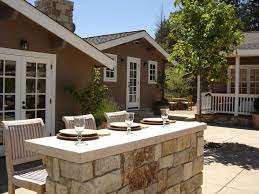 The furniture in the photo looks almost rustic against this beautifully constructed flagstone area. Outdoor Bars Options And Ideas Hgtv