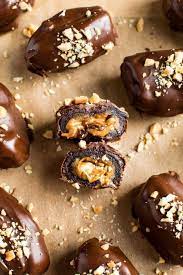 Chocolate Covered Snickers Stuffed Dates Eating Bird Food Recipe Real Food Recipes Food Healthy Sweets
