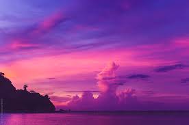 This picturesque beach sunset will make you feel like you're there, rather than at your computer. Beautiful Serene Tropical Purple Sunset Over Thailand S Islands By Wizemark