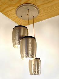 Put A Bulb In It 24 Upcycled Pendant Lights Made From Thrifty Vintage Treasures Diy Lamp Vintage Canisters Pendant Lighting