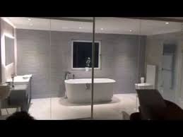 Glass bathroom doors that fog when locked up. Smart Glass Laminated Bathroom Partition From Intelligent Glass Youtube