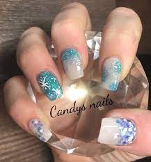 Winter Wonderland Christmas Design Acrylic Nails With A Snowman And Snowflakes Blue Acrylic Nails Nail Art Designs Nails