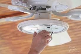 Remove the globe and light bulbs from the existing light kit. How To Install A Ceiling Fan Pretty Handy Girl