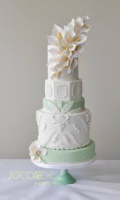 Mint Green And White Magnolia Themed Wedding Cake Made With Satin Ice Joconde Patisserie Green Wedding Cake Big Wedding Cakes Modern Wedding Cake