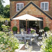 These are our favorite sloped garden solutions. Split Level Garden Makeover With Plant Packed Borders