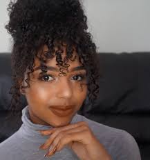 Natural curly hairstyles with fringe. 17 Really Cute Hairstyles For People With Naturally Curly Hair Curly Hair Photos Curly Hair Styles Naturally Curly Hair Styles