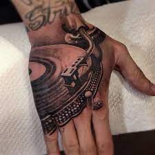 Music Tattoos For Men Hand Tattoos For Guys Music Tattoo Designs Hand Tattoos