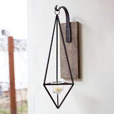 These are available in various traditional as well as modern shapes and designs to cater to the requirements of global clientele. 11 Best Wall Mounted Candle Sconces For 2018 Decorative Candle Sconces And Holders