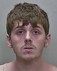 Ocala man charged with pointing gun at table-flipping man