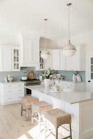 We have everything you are looking for! Coastal Kitchen With Blue Backsplash Home Decor Kitchen Beach House Kitchens Home Kitchens