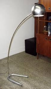 A perfect curve holds a cylindrical fabric shade at the end allowing you to direct light exactly where you need it. Vintage Mid Century Modern Arc Floor Lamp