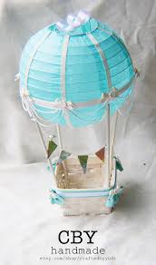 This balloon decoration idea is approx 7.5' tall and perfect for all types of parties/events! This Exquisite Hot Air Balloon Has Been Handcrafted Using A Light Blue Lantern T Hot Air Balloon Decorations Elephant Baby Shower Candy Hot Air Balloon Nursery