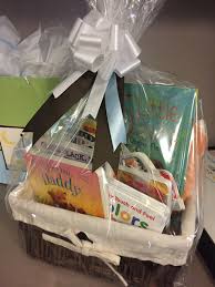 Adorded baby precious gift basket wonderful for showers features pink wicker basket overflowing with gifts including 15 high quailty toy battery powered therometer, bottle brush, photo brag book, monogramable bib and burb cloth Baby S First Library Gift Basket Baby Shower Gift Basket Book Gift Basket Baby Gift Basket