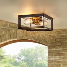 Home Decorators Collection Walden Forge 2 Light Black Frame Flush Mount Ceiling Light With Antique Brass Sockets Hd 1550 I The Home Depot