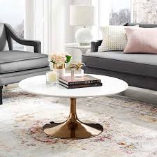 This rose gold table is prefect size for a small apartment and very sturdy. Odyssey 36 Round Modern Rose Gold Coffee Table Eurway