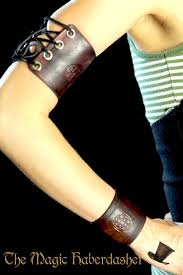 Pair of bicep bands, handmade to fit your measurements in your choice of leather and fittings. Leather Arm And Wrist Band Set By Themagichaberdasher On Etsy 40 00 Wristband Wrist Wrist Cuffs