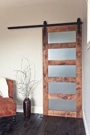 The Glass Panel Sliding Barn Door Is The Ultimate Addition To Any Home Unique Custom Designed Piece Captu Glass Barn Doors Glass Panel Door Custom Barn Doors
