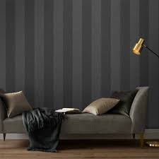 The white walls around the fireplace also create a coastal feel. Heritage Stripe Charcoal Wallpaper Grey Wallpaper Graham Brown