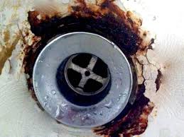 Bathtub drain removal starts with identifying the type of drain stopper your bathtub has so that you the drain basket will have a metal crossbar at the bottom. Bathtub Drain Overflow Rust Hole Repair