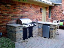 Upcycled wood and brick outdoor kitchen. Michigan Landscape Projects And Designs By Miller Landscape Inc Outdoor Kitchen Patio Brick Patios Patio