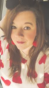 When you need earrings to match the sweater you take the pompoms from the  Valentine's Day bowl fillers and make your own.