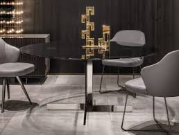Expandable dining tables are always good to have in the house. Minotti London Products