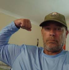 What could be causing water to mix with oil in a 1996 Mercruiser 5.7L  engine after intake gasket replacement?