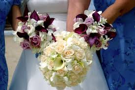 Unique blooms paired with peacock feathers make up a chic and bold wedding bouquet. Unique Bridesmaid Bouquets Unique Bridesmaid Bouquet