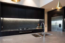 Dark Kitchen With Unique And Luxurious Details Dark Kitchen Kitchen Inspirations Handleless Kitchen