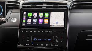 The dashboard is cleanly styled with a design that wraps elegantly from the center stack to the door panels. 2022 Hyundai Tucson Driveway And Infotainment Test No Knobs No Probs