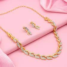 Sukkhi Graceful Gold Plated Wedding Jewellery Austrian Diamond Necklace Set Nyksukhi00034 Buy Sukkhi Graceful Gold Plated Wedding Jewellery Austrian Diamond Necklace Set Nyksukhi00034 Online At Best Price In India Nykaa Find the perfect gold jewelry set: sukkhi graceful gold plated wedding jewellery austrian diamond necklace set nyksukhi00034