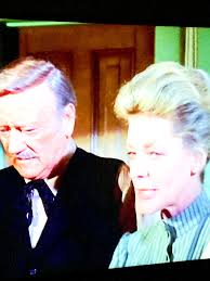 John Wayne and Lauren Bacall in The Shootist! Wayne's last film and maybe  his best. Ron Howard still says the only time he was scared to act because  of Wayne and Bacall