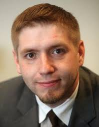 Absentee county official's salary could be slashed to $1