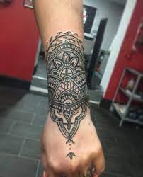 100 Wrist Tattoos Tattoo Ideas Wrist Tattoos For Guys Tattoos Polynesian Tattoos Women
