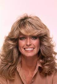 These golden tinted 1970s flicks are synonymous with the bombshell. The 50 Most Iconic Hairstyles Of All Time 70s Hair Hair Styles 1970s Hairstyles