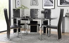 These pieces may feature wood or metal frames and a circular, square or rectangular surface. Space Chrome And Black Glass Extending Dining Table With 6 Celeste Black Leather Chairs Furniture And Choice