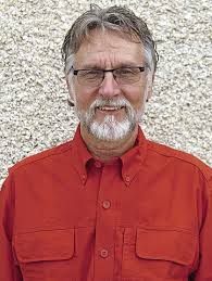 Arnett moves out of area, resigns from college board