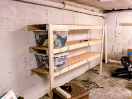 Maya from maya made had an old wooden ladder, and then she cut pieces of barn wood to form shelves across the ladder rungs. Easy Diy Garage Shelves For 40 In Lumber