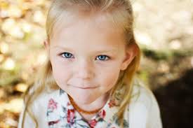 Two years ago I met this wonderful family and I had the privilege of taking  their pictures. They had asked me again this year....and they just keep  getting cuter! Thank you for